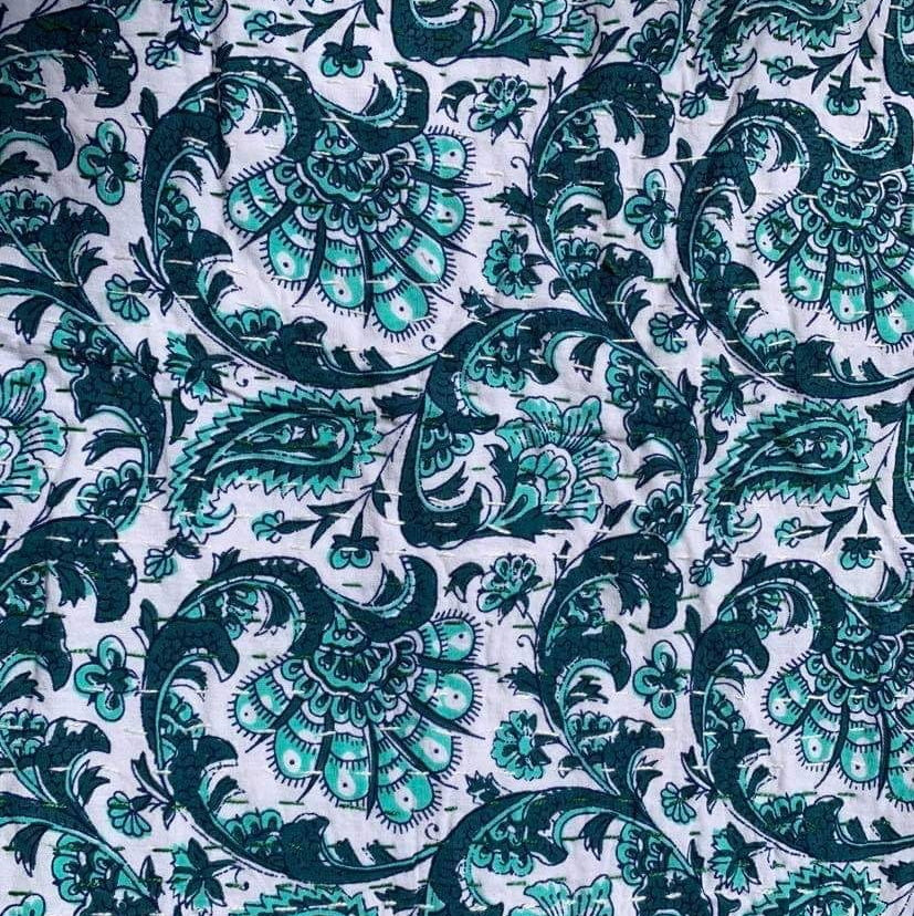 Green baby bedspread close-up