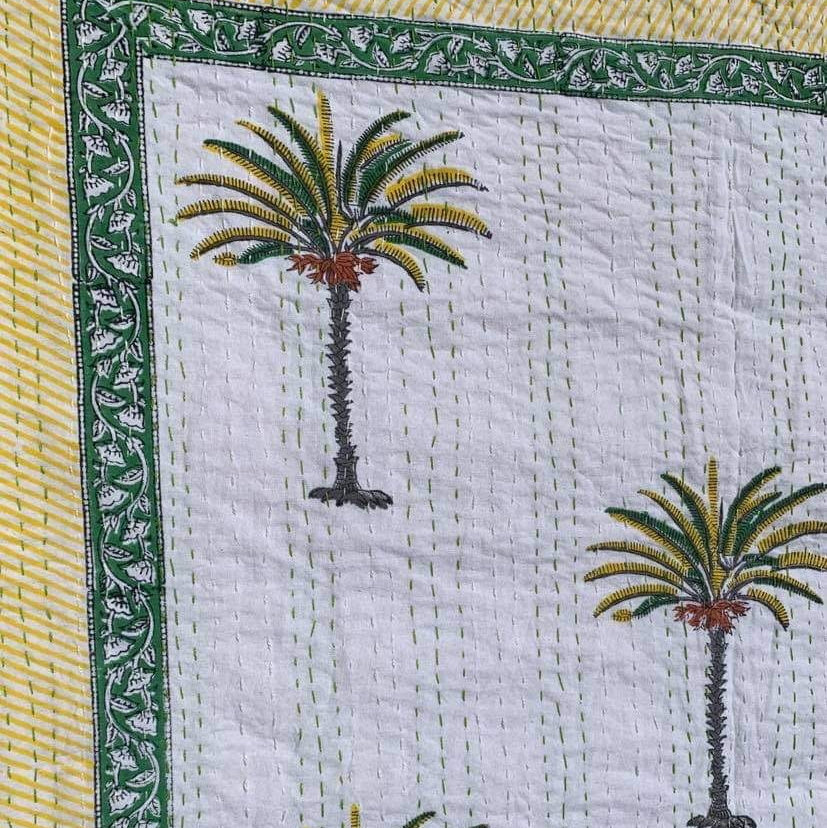 Baby palm bedspread close-up