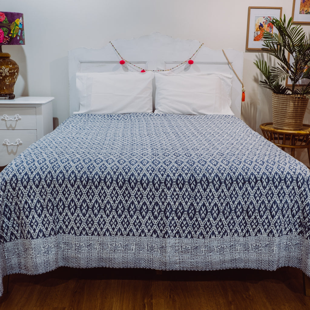 Blue Diamond bedspread on bed