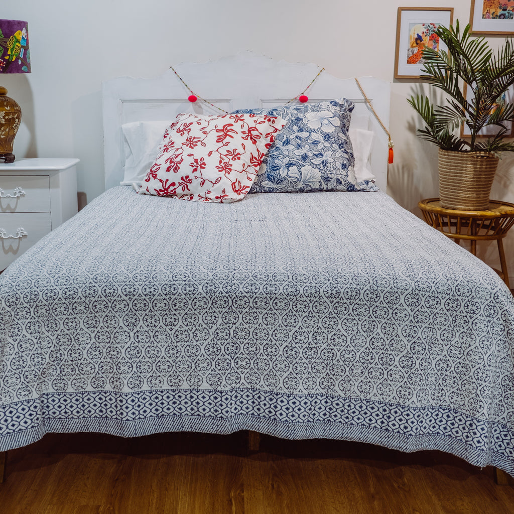Blue Maze bedspread on bed