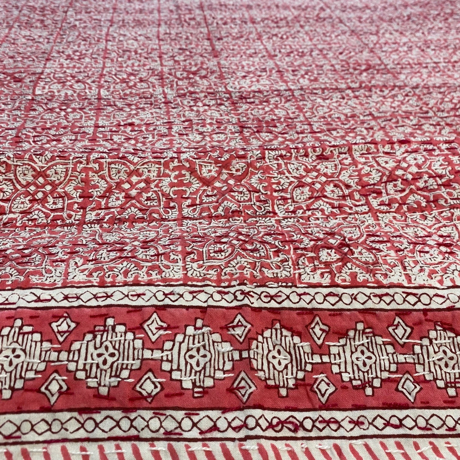 Pink Bedspread Coverlet on Bed